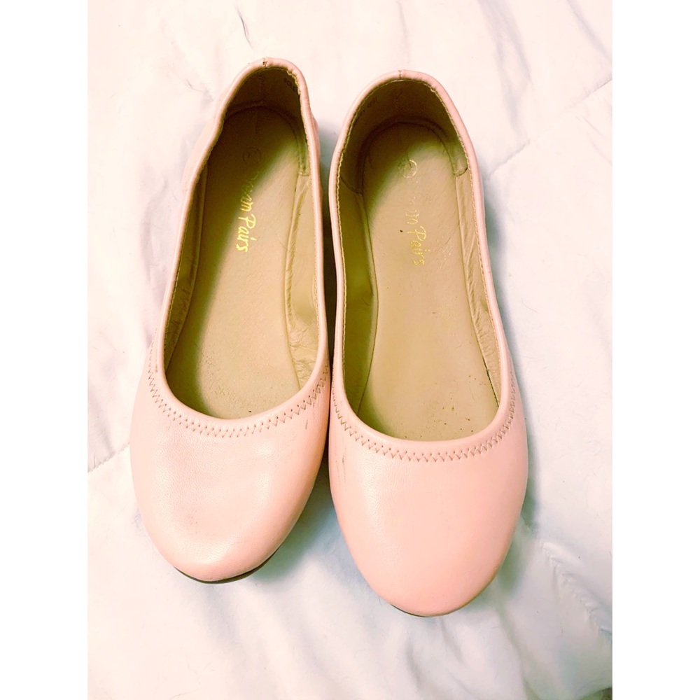 Blush pink ballet flats.